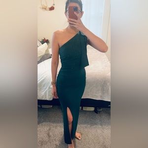 Emerald green dress in size small. One shoulder with a bow detail.